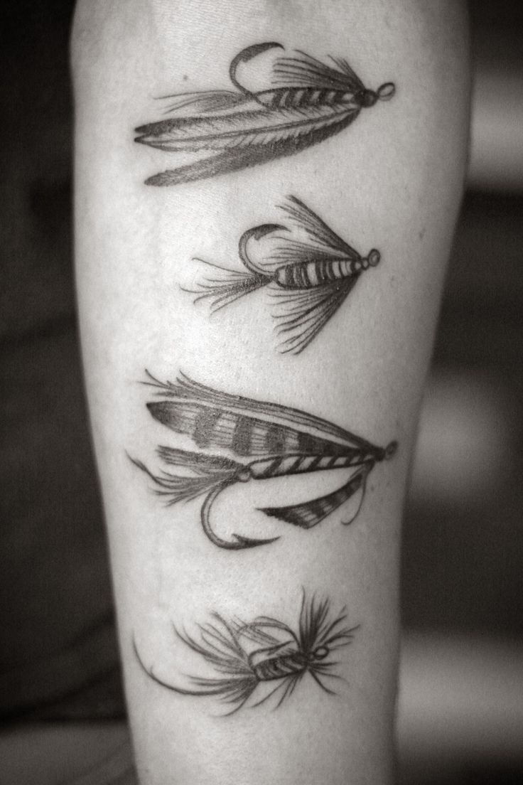 Black Ink Feather Lure Hooks Tattoo Design For Sleeve By Alice Carrier