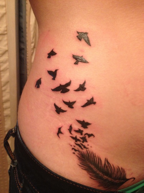 Black Ink Feather With Flying Birds Tattoo On Girl Right Hip