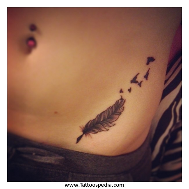 Black Ink Feather With Flying Birds Tattoo On Left Hip
