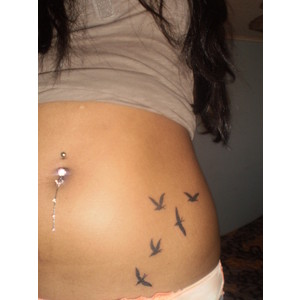 Black Ink Flying Birds Tattoo On Girl Left Hip