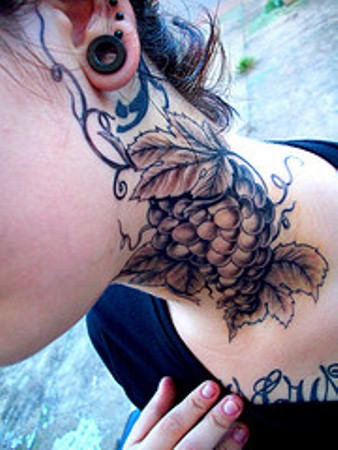 Black Ink Grapes Tattoo On Girl Side Neck