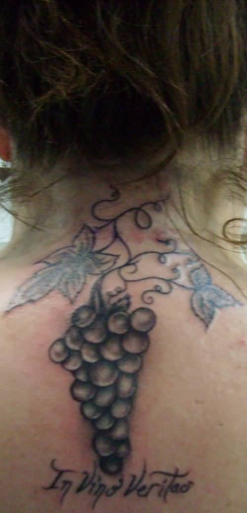 Black Ink Grapes Tattoo On Girl Upper Back