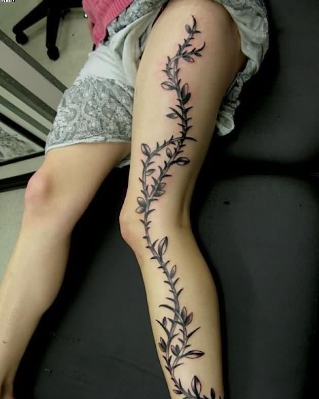 Black Ink Poison Ivy Plant Tattoo On Girl Left Full Leg