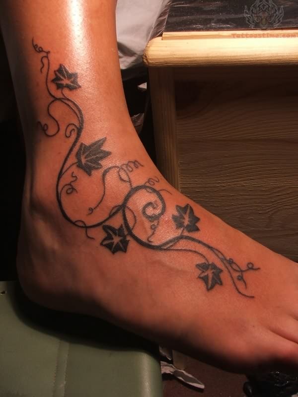 Black Ink Poison Ivy Plant Tattoo On Right Foot