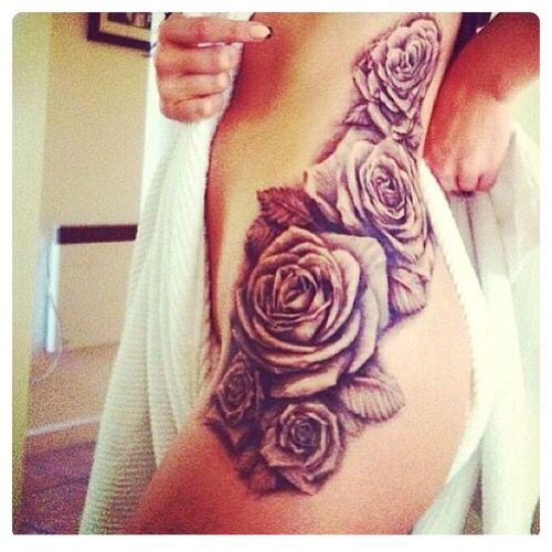 Black Ink Roses Tattoo On Girl Left Hip
