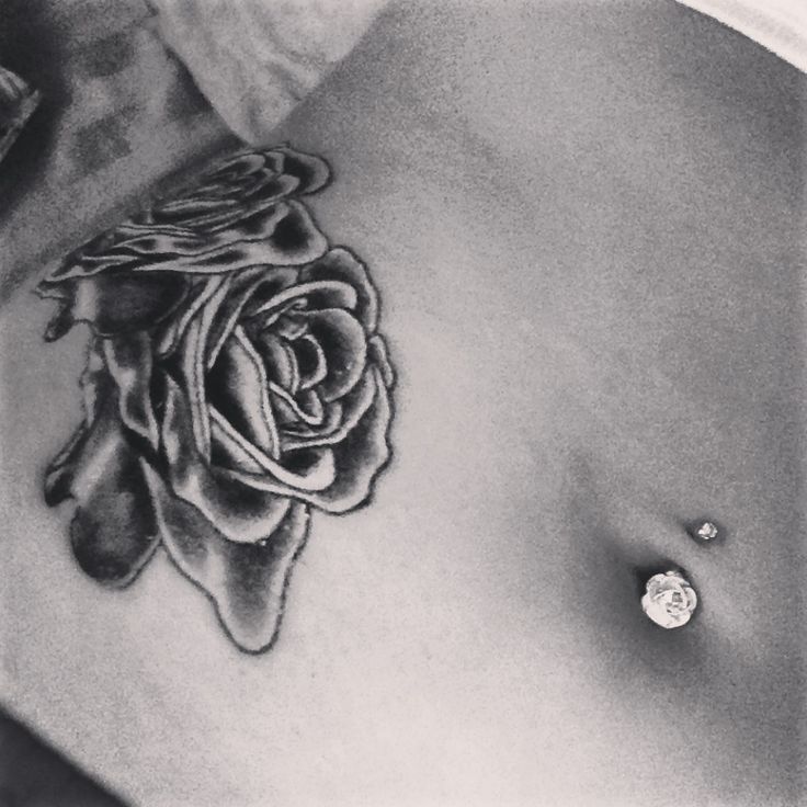 Black Ink Roses Tattoo On Hip