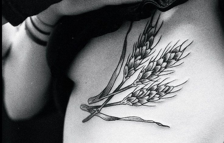 Black Ink Wheat Stalk Tattoo Design For Girl