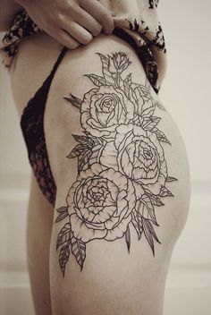 Black Outline Flowers Tattoo On Girl Left Hip