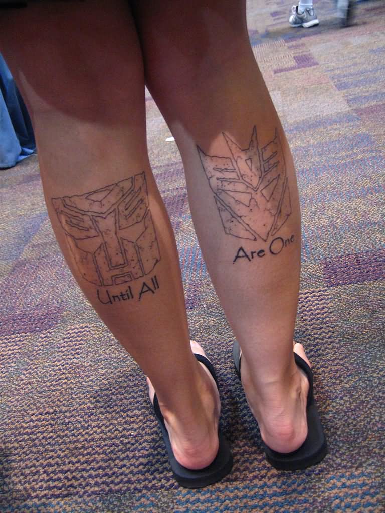 Black Outline Two Transformer Symbol Tattoo On Both Leg Calf