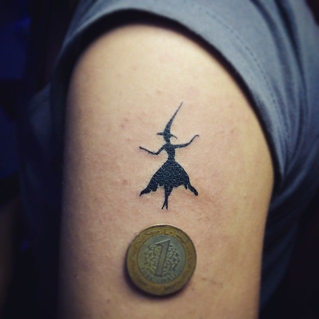 Black Silhouette Witch Tattoo On Shoulder