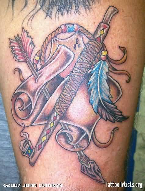 Classic Arrow In Scroll With Pipe Tattoo Design