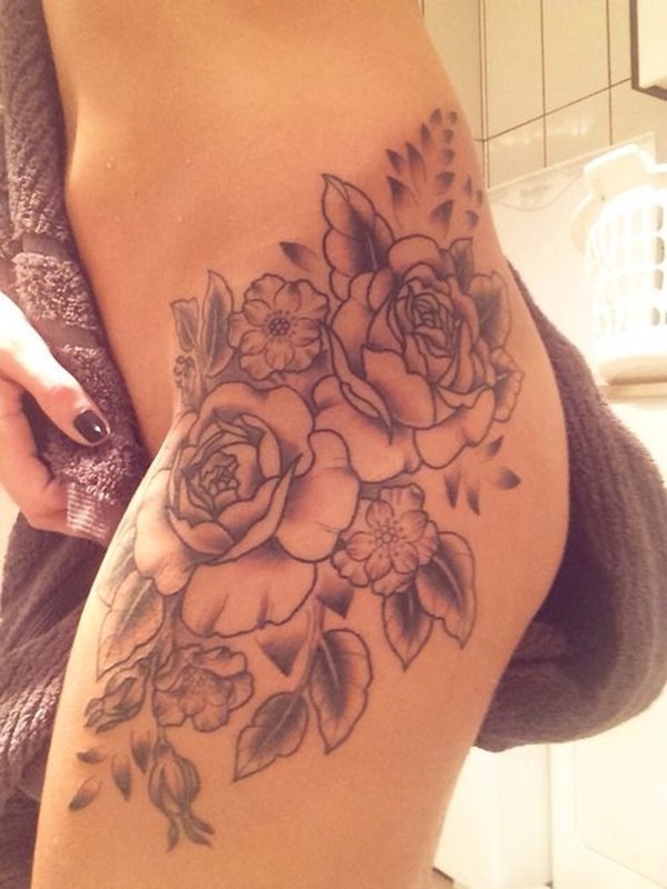 Classic Black Ink Flowers Tattoo On Girl Left Hip