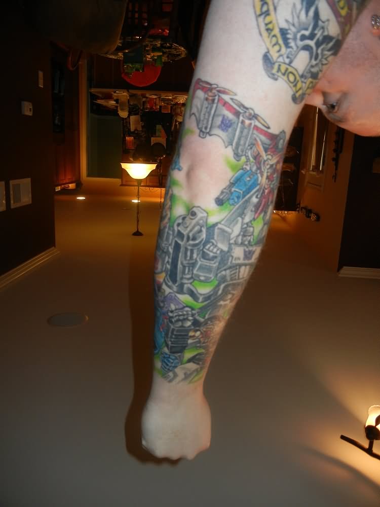 Classic Transformers Tattoo On Right Sleeve