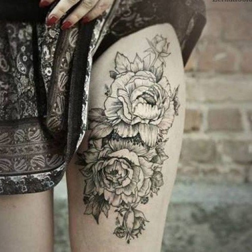 Cool Black And Grey Peony Flowers Tattoo On Girl Left Thigh