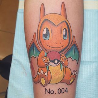 Cool Charmander With Pokemon Ball Tattoo Design For Forearm