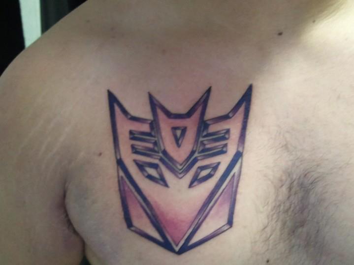 Cool Transformer Logo Tattoo On Right Front Shoulder