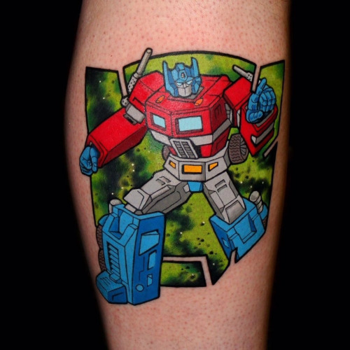 Cool Transformer Starscream With Logo Tattoo Design For Leg Calf