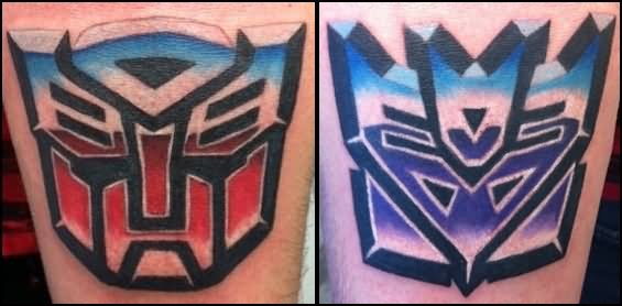Cool Two Transformer Symbol Tattoo Design For Arm