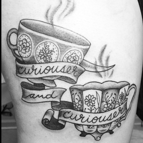 Curiouser And Curiouser Banner With Black And White Teacup Tattoo