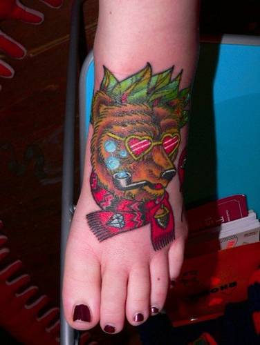 Cute Bear Smoking Pipe Tattoo On Girl Left Foot