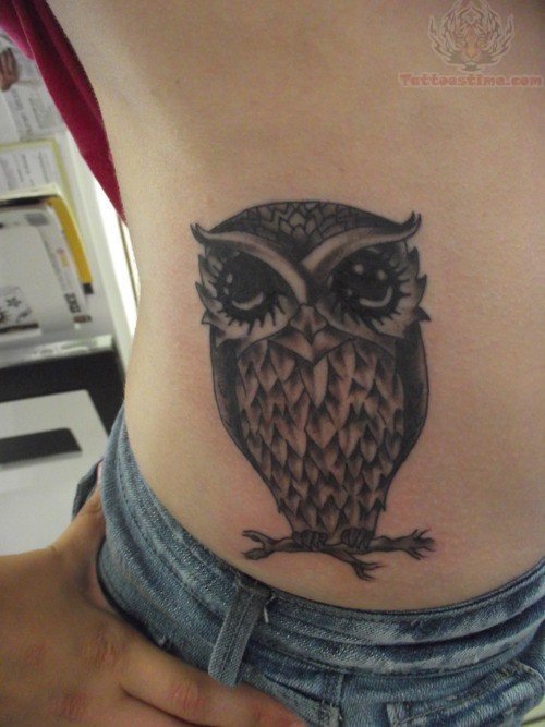 Cute Black Ink Owl Tattoo On Right Hip By Megan West