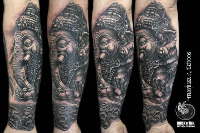 Dark Ink Ganesha Tattoo On Forearm