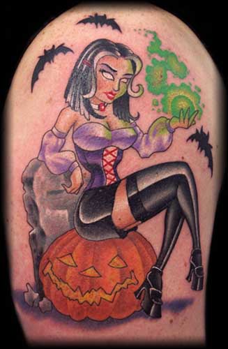 Flying Bats And Witch Sit On Pumpkin Tattoo On Shoulder