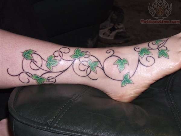 Green Ink Poison Ivy Plant Tattoo On Right Foot