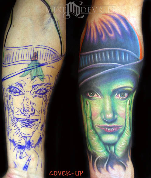 Green Ink Witch Face Tattoo On Full Sleeve