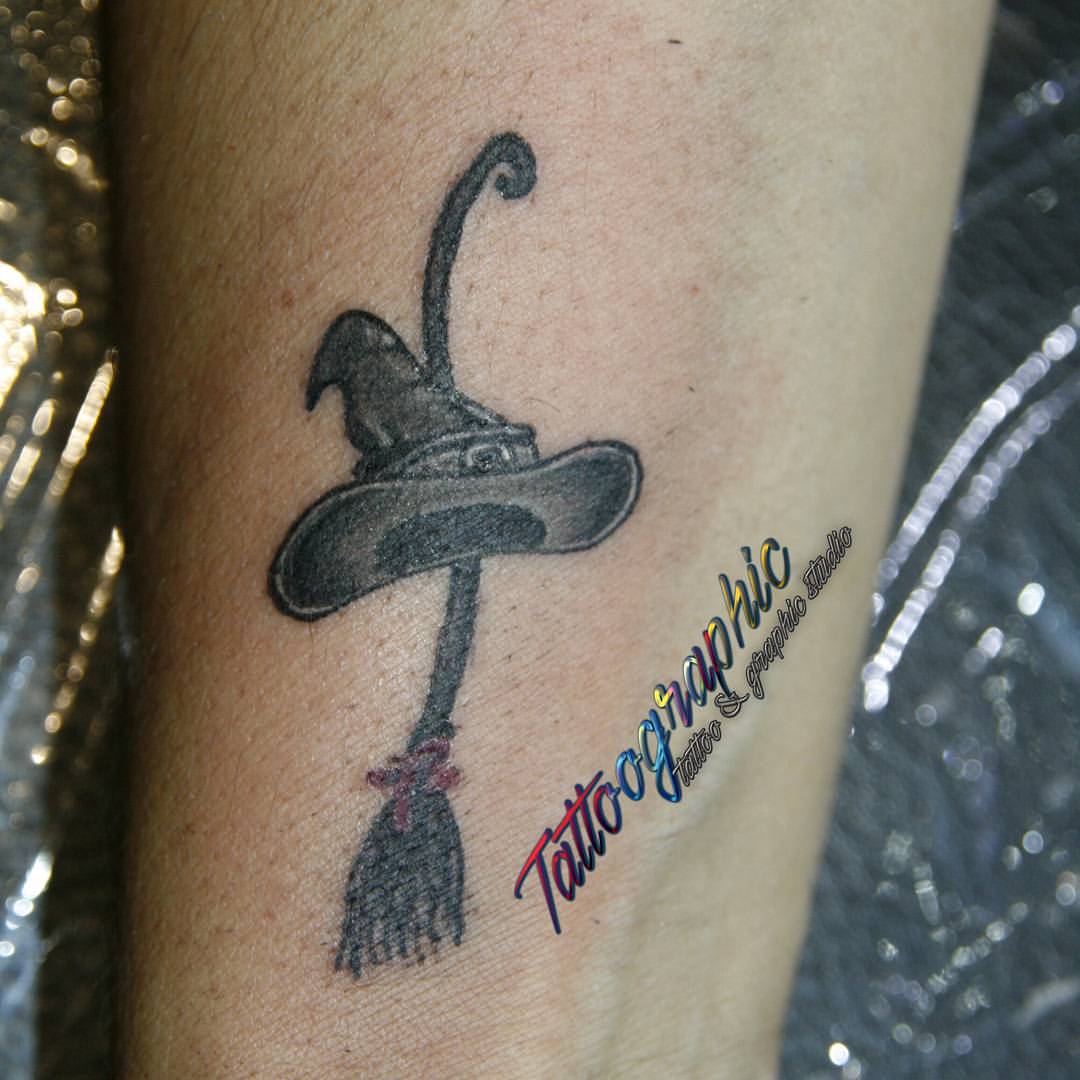 Grey Ink Broom And Witch Hat Tattoo
