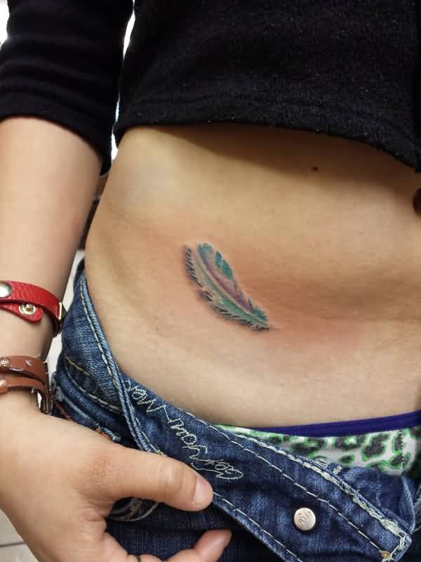 Grey Ink Feather Tattoo On Right Hip