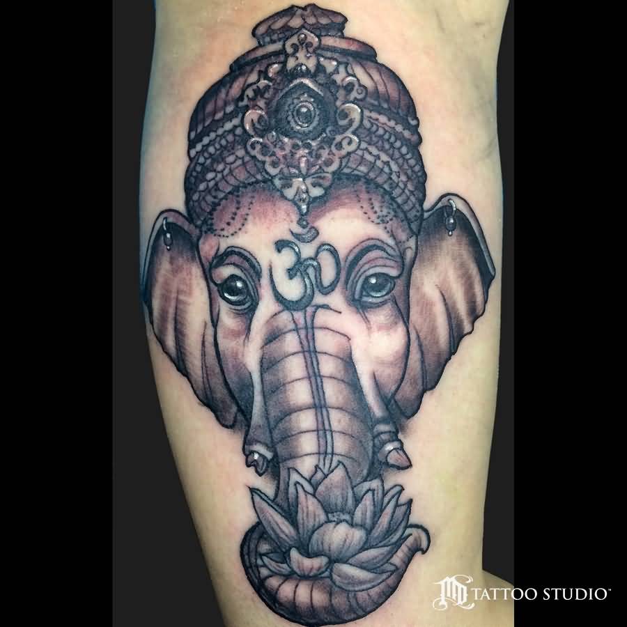 Grey Ink Ganesha Head Tattoo On Leg
