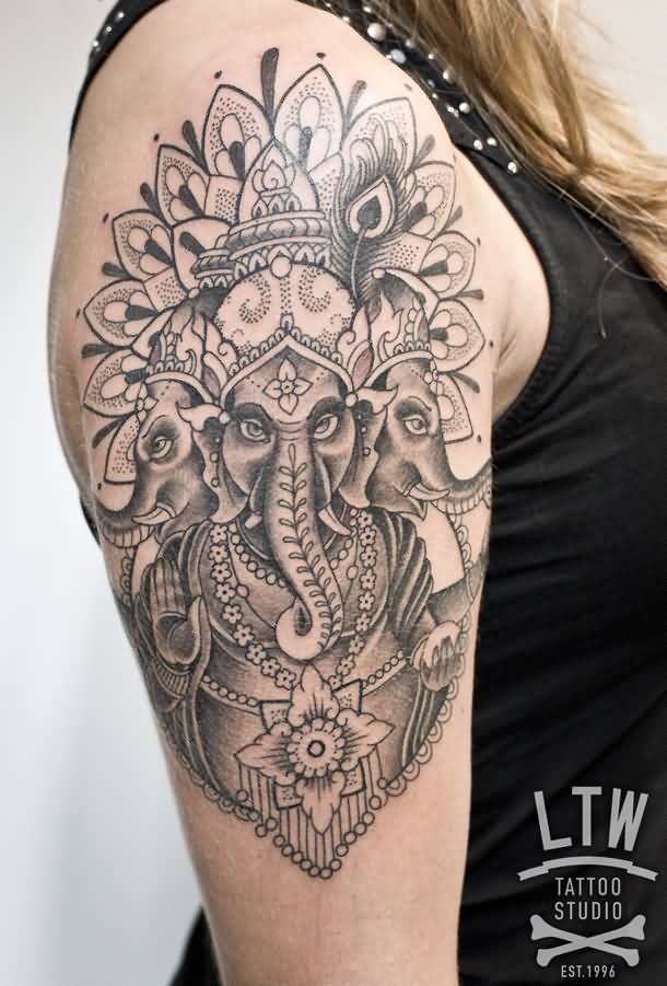 Grey Ink Ganesha Tattoo On Girl Right Half Sleeve