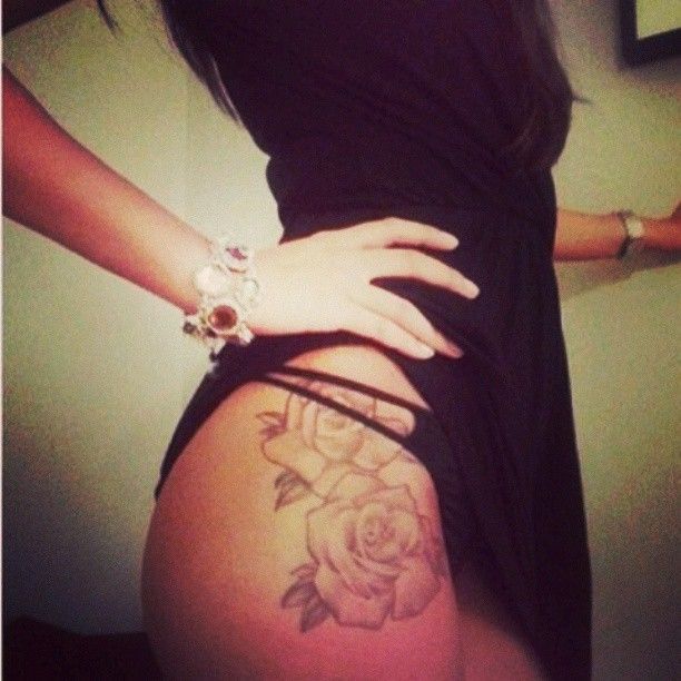 Grey Ink Roses Tattoo On Girl Right Hip