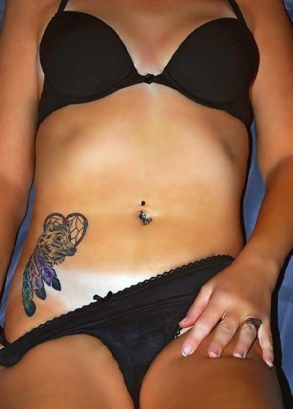 Heart Dreamcatcher With Wolf Head Tattoo On Girl Right Hip