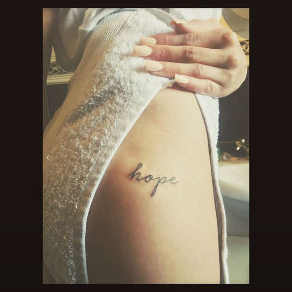 Hope Word Tattoo On Girl Hip