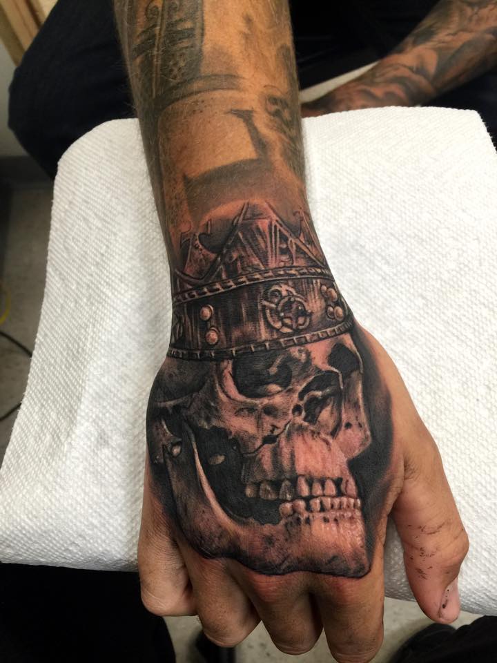 King Richard Skull Tattoo On Right Hand by Carl Grace