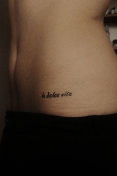 La Dolce Vita Word Tattoo On Left Hip