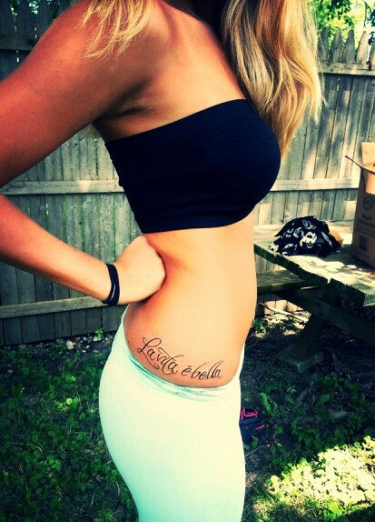 La Vita E Bella Words Tattoo On Girl Right Hip