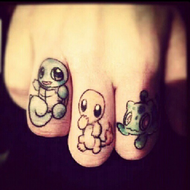 Little Squirtle, Charmander And Bulbasaur Tattoo On Finger
