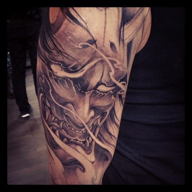 Nice Grey Ink Hannya Tattoo On Half Sleeve