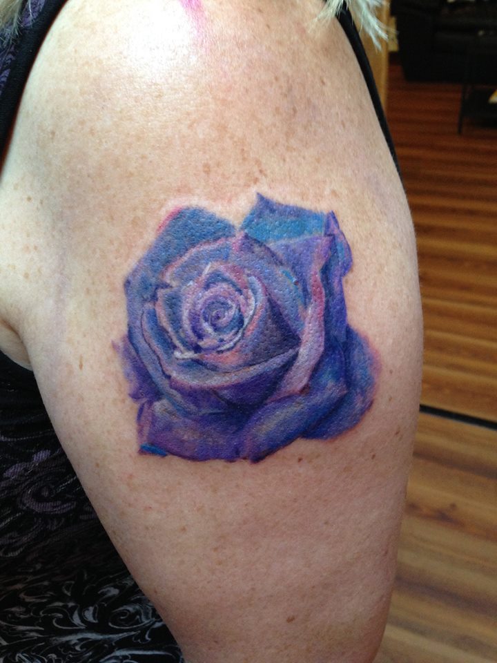 Nice Purple Rose Tattoo On Left Shoulder