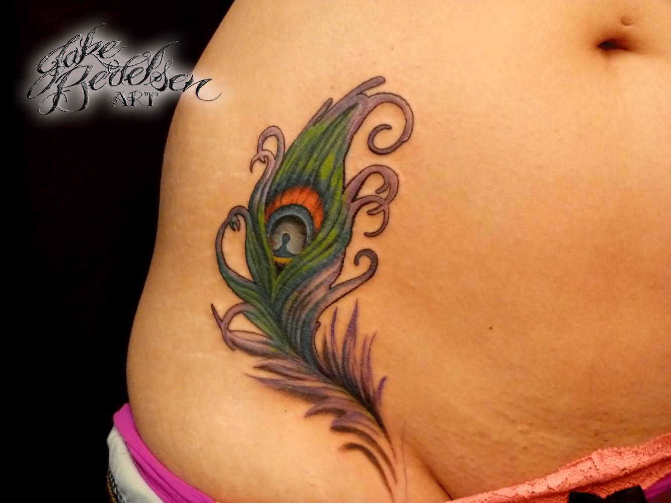 Peacock Feather Tattoo On Girl Right Hip