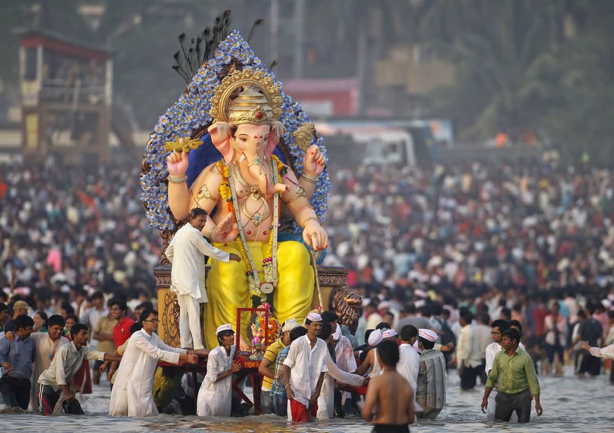 People With Ganesha Idol To Immersion Celebrating Ganesh Chaturthi