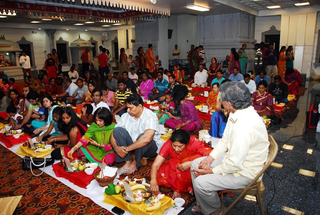 People Worshipping During The Ganesh Chaturthi Celebration