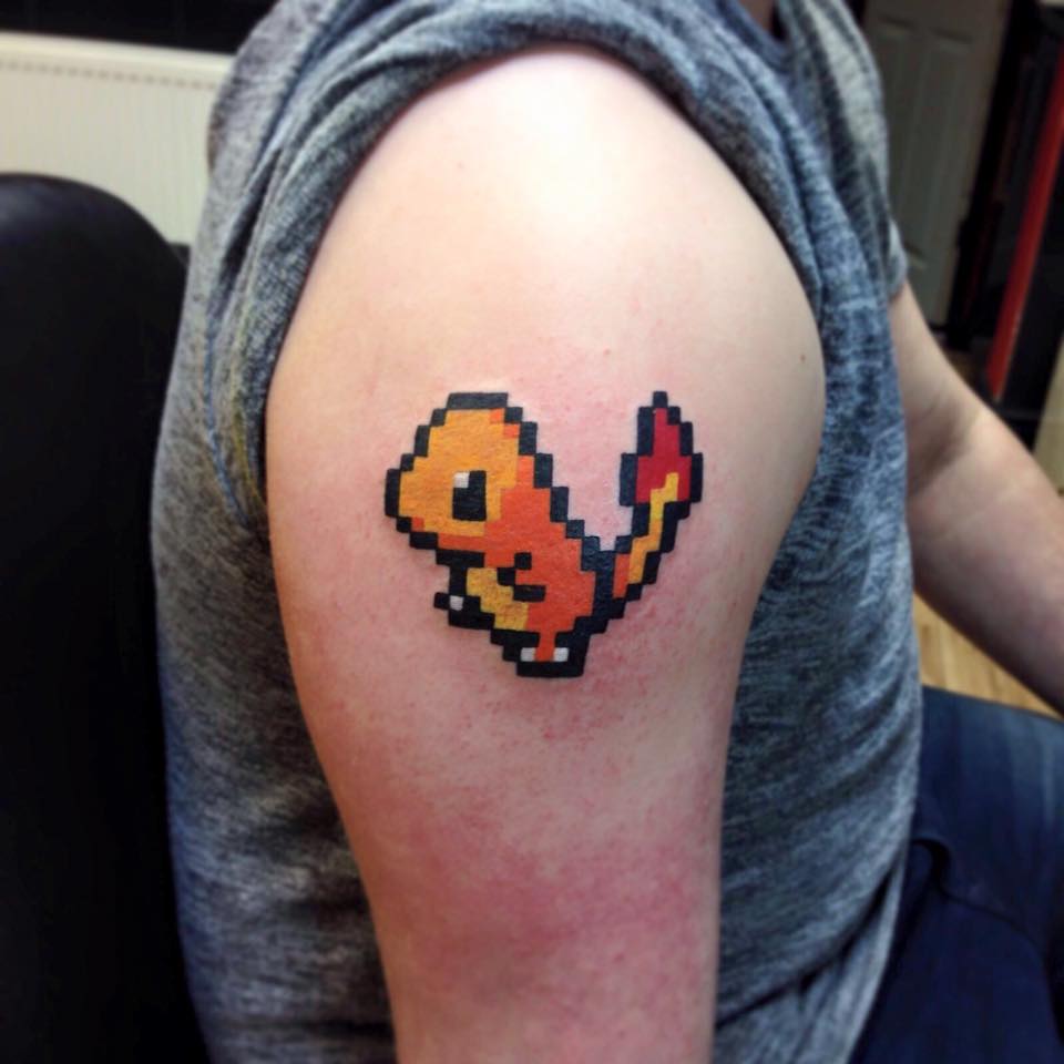 Pixel Charmander Pokemon Tattoo On Right Shoulder