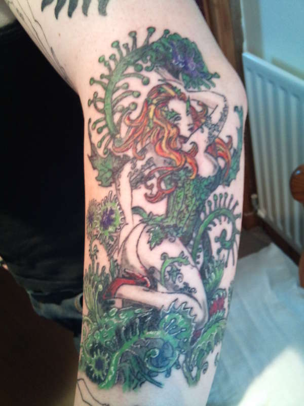 Poison Ivy Tattoo On Left Arm
