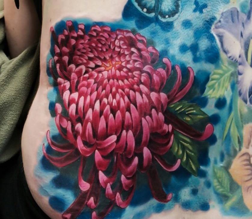 Poppy Flower Tattoo On Lower Back by Mike Evans