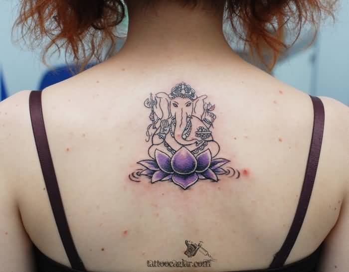 Purple Lotus Ganesha Tattoo On Upper Back
