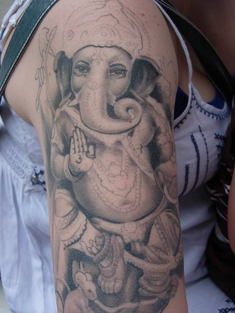 Realistic Grey Ink Ganesha Tattoo On Half Sleeve